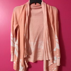 peach and white cardigan